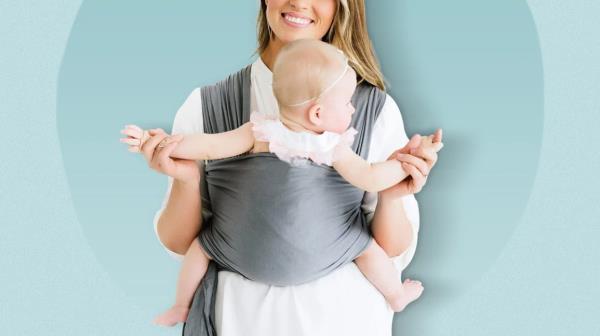 woman holding baby in a baby wrap