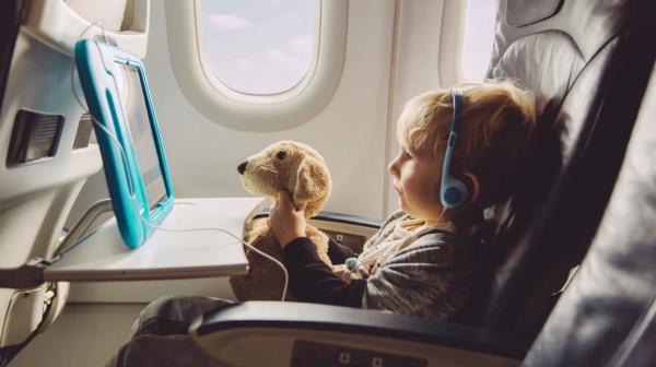 toddler on airplane flight